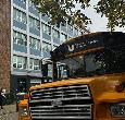 Front of Yellow Bus during a Teesside University open day event
