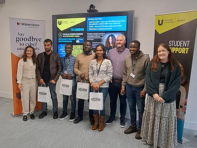 Members of the winning team with Waterstons representatives and Victor Onyenagubon, Cyber Security Module Leader