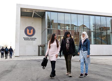 Business International School building at Teesside University with students outside