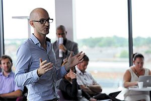 Teesside University staff member speaking at a business conference