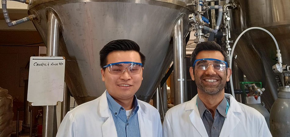 Dr Danial Qadir (Research Fellow at Net Zero Industry Innovation Centre) and another member of staff