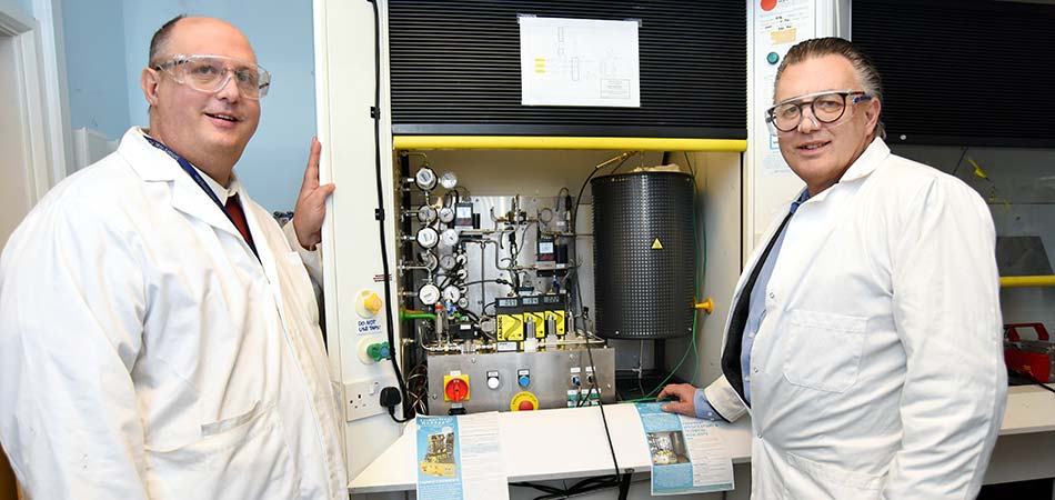 Gary Lawson, Managing Director of DarbyTech, and Paul Russell from the hydrogen project team with a hydrogen reactor
