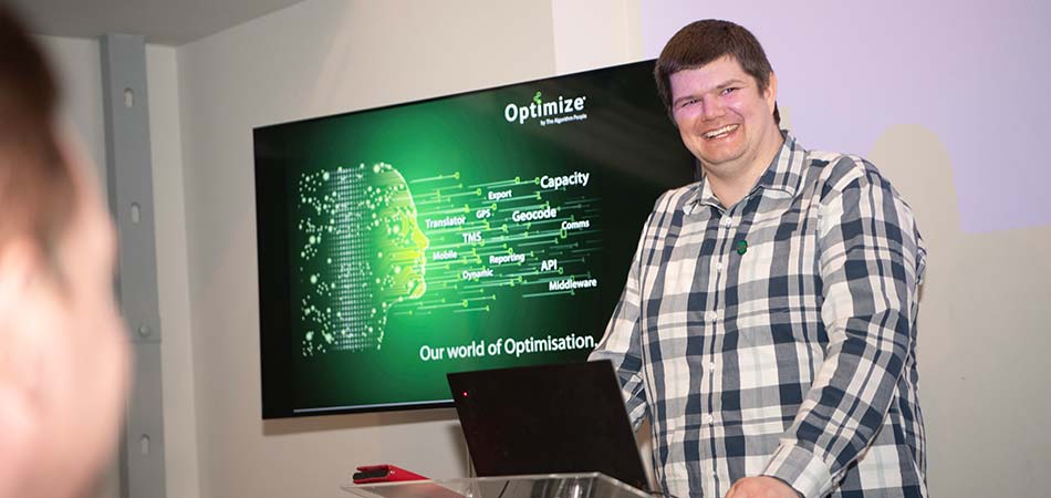 Optimize (The Algorithm People Limited) staff member talking in a conference