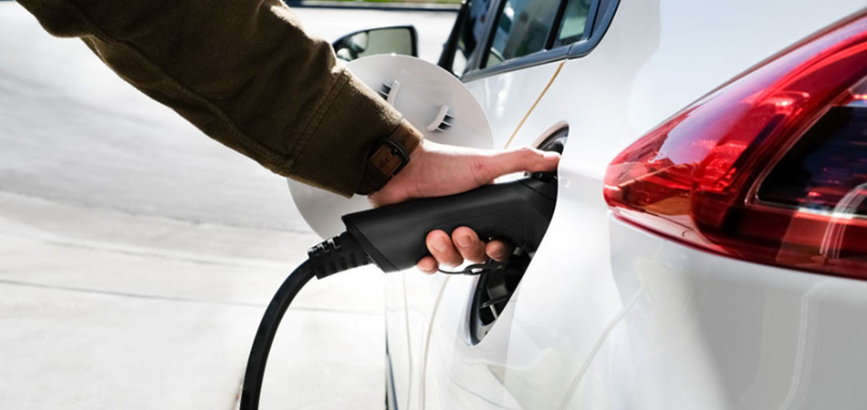 Electric car connected to a charger