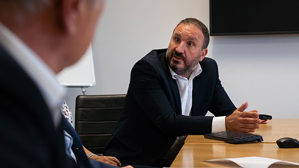 University staff in a meeting providing consultancy support