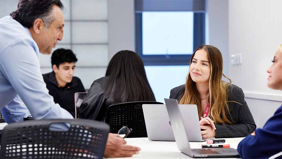 Students and lecturer in a classroom