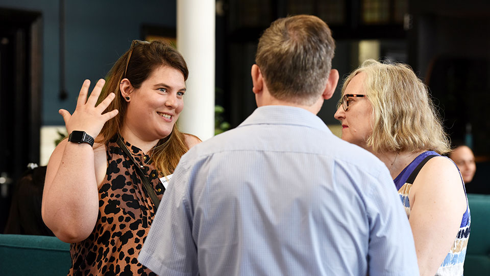 Teesside University alumni engaging in conversation at an alumni event