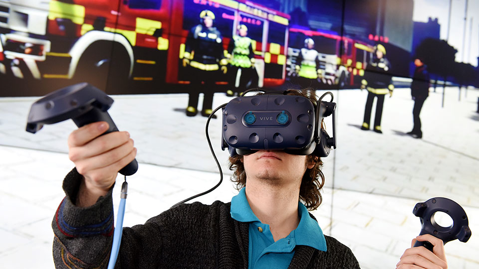 Student using virtual reality (VR) headset for an interactive or educational experience