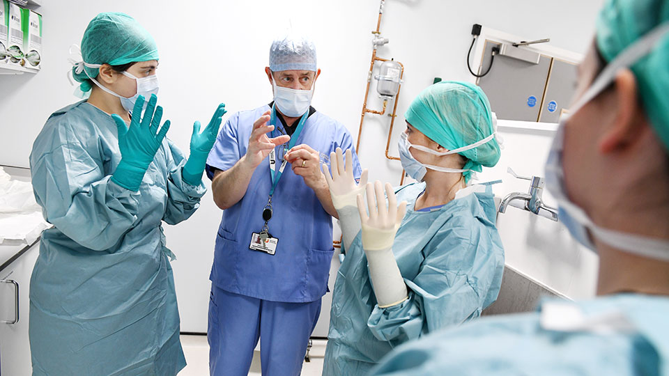 Medical staff and students interacting in a healthcare training environment