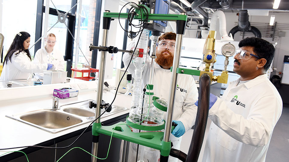 Staff and students working together in a NetZero research lab at Teesside University