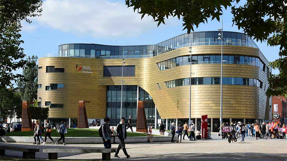 The Curve building at Teesside Universityâ€™s Campus Heart on a sunny day