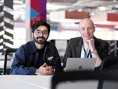 Student receiving advice at Teesside University London